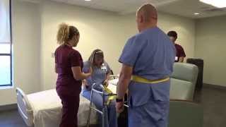 Physical Therapy Transfer Training  How To Transfer From Wheelchair To Bed [upl. by Ashelman]